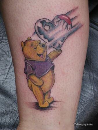 http://rattatattoo.com/wp-content/uploads/2012/07/winnie-the-pooh-bear-love-heart-tattoo-cute-passion-relationship-unwrap-heart-cartoon-animal-tat-design-skin-ink.jpg