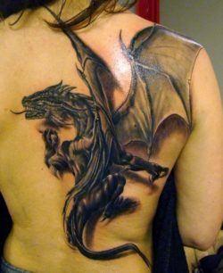 A 3D tattoo of a western fantasy dragon in black tattoo ink