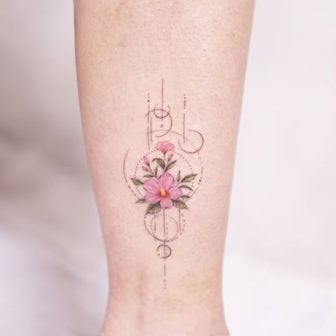 Korean tattooist Silo inked this elegant and delicate flower design on the ankle. The design is inoffensive and so the tattoo owner has chosen to have it tattooed in a place that can be seen when wearing summer clothes such as shorts and sandals.