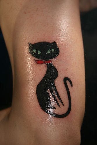 A stylized tattoo of a black cat, a symbol of magic and mystery and a companion of witches 