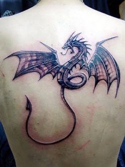 An Evil looking Western dragon tattoo design has the mythical creature hissing and flapping its wings