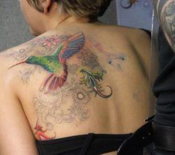 Hummingbird tattoos are a symbol of beauty, sweetness and mystery