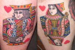 Two tattoos that depict typical playing card designs for the King and Queen of Hearts