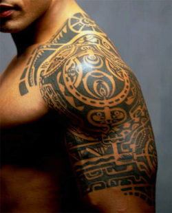 Dwayne Johnson aka The Rock has a Samoan tribal tattoo on his chest and arm