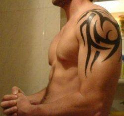 Tribal tattoo designs are popular with male athletes and mixed martial arts fighters