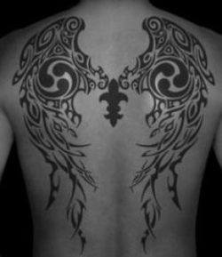 A tattoo of tribal wings can be a symbol of angelic warriors or religious soldiers