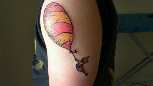 A Dr Seuss tattoo of a character from the inspirational poem Oh the Places You'll Go!