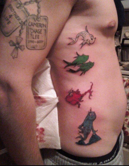 A Dr Seuss tattoo of the characters from One Fish, Two Fish, Red Fish, Blue Fish