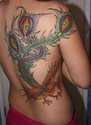 A peacock phoenix tattoo design that includes the eyes on the peacock's tail feathers to symbolize awareness