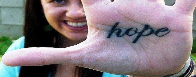 A tattoo of the word hope on this woman's palm - a lovely reminder to keep your hopes up