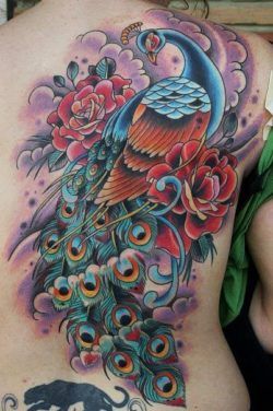 This beautiful old school tattoo design of a peacock bird includes roses to add the meaning of passion