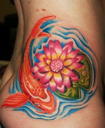 This cute and colorful koi and lotus flower tattoo is a bright reminder of change, and that success is a result of hard work.