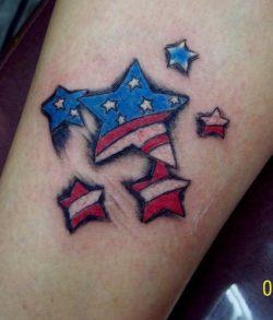 A patriotic tattoo of the American flag that has stars within stars