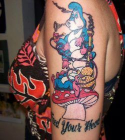 A tattoo of the Disney Hookah Smoking Caterpillar from Alice in Wonderland