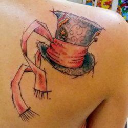 Tattoo of a drawing of the hat worn by Johnny Depp in Alice In Wonderland