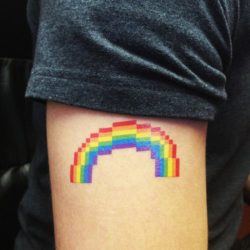 A pixel rainbow tattoo design that can be worn as a colorful symbol of gay and lesbian rights