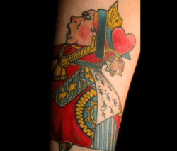 A tattoo of the playing card Queen of Hearts from Alice in Wonderland