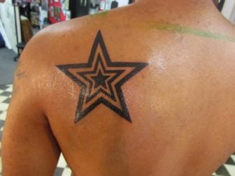 Star tattoos can be a symbol of fame or notoriety. A star within a star is a symbol of natural talent and greatness
