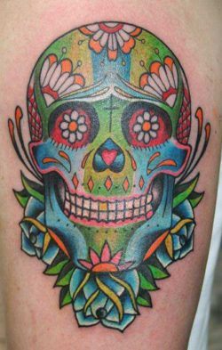 A colorful Day of the Dead sugar skull tattoo design, also known as a calavera tattoo