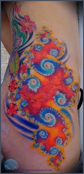 A colorful and trippy fractal tattoo, very psychedelic with the flowers