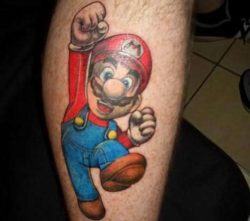 A cute video game tattoo of the famous arcade character Mario jumping and punching the air