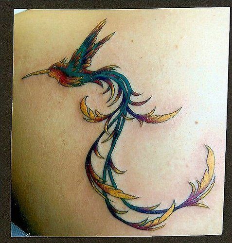 A hummingbird phoenix tattoo design that uses elegant curving lines to create the fantastic tail