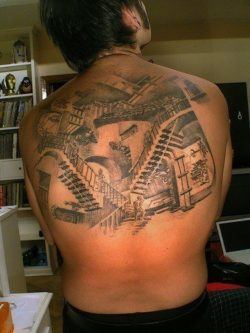 A large back tattoo of the stairs of relativity by graphic designer and artist MC Escher