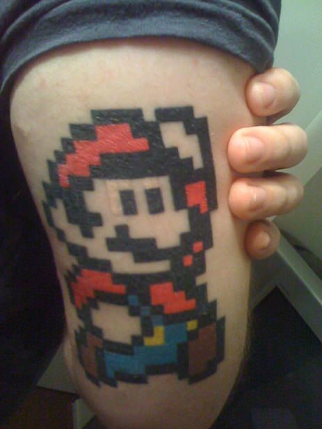 A pixel tattoo of the Nintendo video games character Mario, from the popular 1980s arcade games