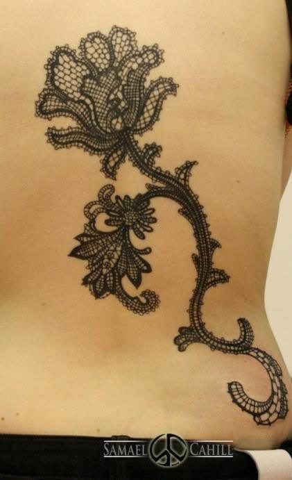 A tattoo of a flower made out of lace work is perfect for girls and women wanting to celebrate their femininity