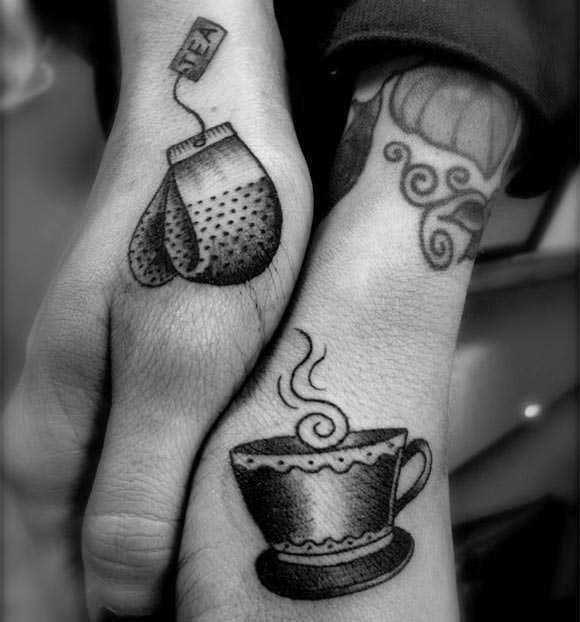 Two tattoos of a tea bag and tea cup celebrate this ancient drink from China through body art