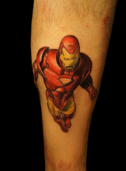 A tattoo of Iron Man flying, watching over the world below