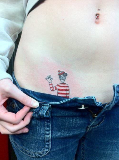 Finally, an answer to the question Wheres Waldo. Hes in this tattoo, peeking out of this girls pants