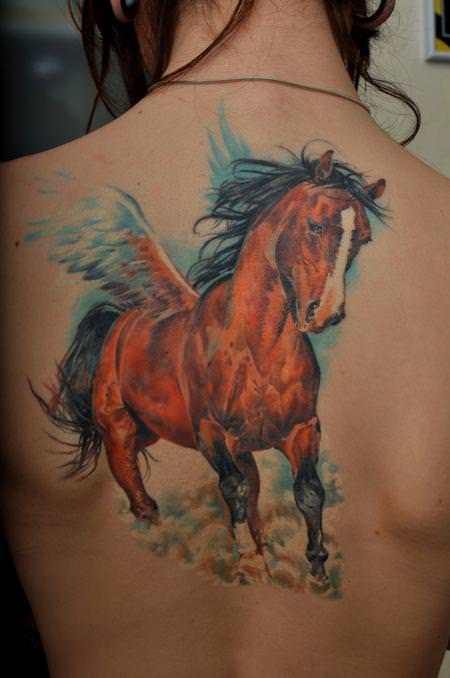 A beautiful tattoo by Dmitriy Samohin of a mythical flying horse called Pegasus