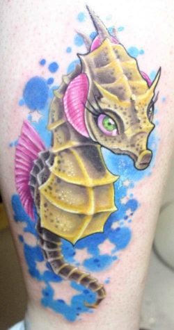 A cute seahorse tattoo with big cartoon eyes and long eyelashes, a perfect design for a girly girl