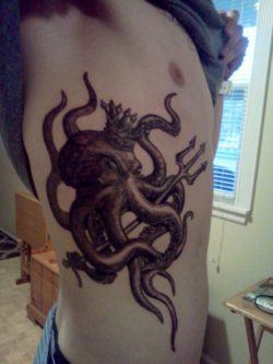 An octopus tattoo that depicts Poseidon, the Greek god of the sea who was thought to wear a crown and carry a sceptre