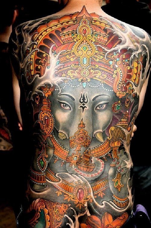 This Ganesh tattoo shows the god with only two arms. 
