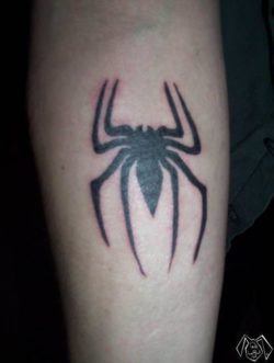 This tattoo show the spider symbol used for Spiderman