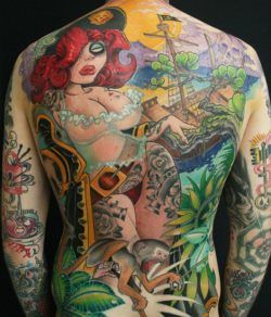 A full back tattoo by Jee Sayalero of a pin up pirate girl in a new school style