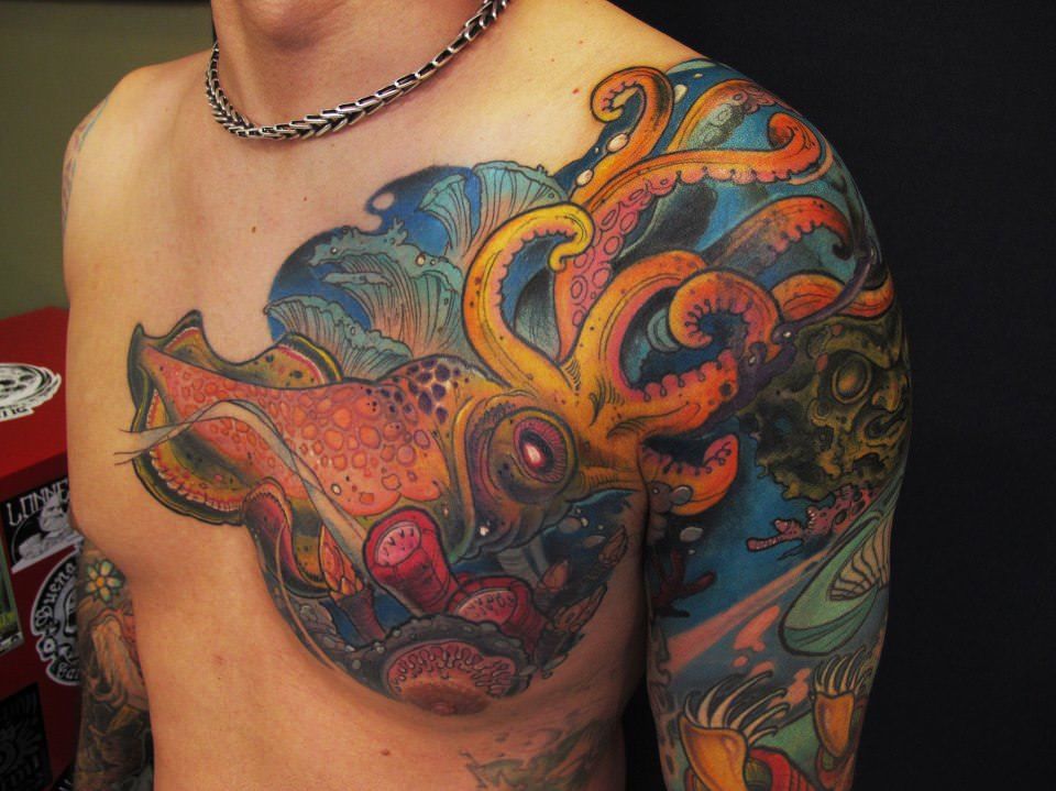 Sayalero has used warm yellow tattoo ink to make this cuttlefish stand out against a cool blue background