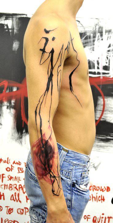 The blank space in this abstract tattoo by Musa is as important to the design as the ink work