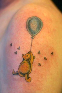 A tattoo by Shaun Christopher that shows Winnie the Pooh as originally illustrated by Shepard