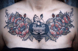 David Hale combines heraldry and popy flowers in this symbolic tattoo design