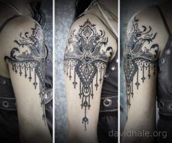 Paisley and lace designs converge in this beautiful tattoo by artist David Hale