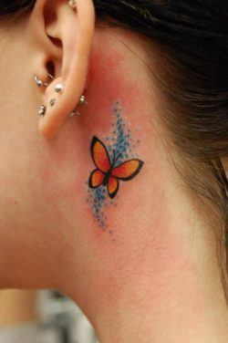 This tiny butterfly tattoo is pretty cute, hiding behind the ear