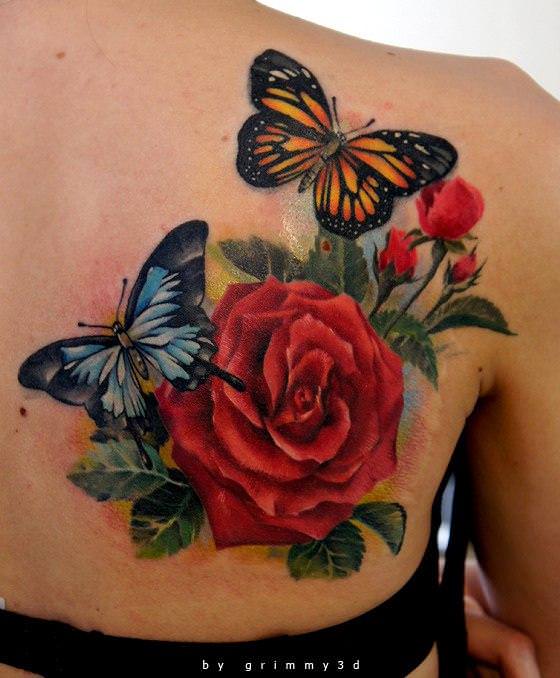 Two butterflies pose with a red rose flower in this colorful tattoo design