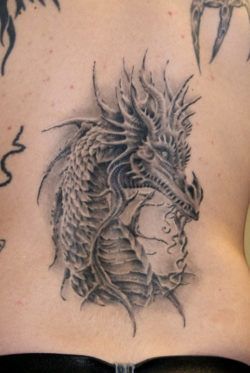 A photo realistic tattoo design of a Western dragon by Robert Litcan