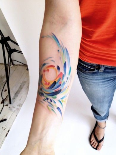 Amanda Wachob takes abstract art to skin in this floral or feathery tattoo design