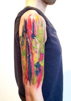 Amanda Wachob transfers a wet paint abstract painting to skin in this artist arm tattoo