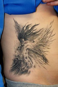 An elemental fairy takes human form in this black and white fantasy tattoo by Robert Litcan