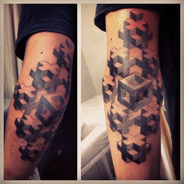 Gregorio Marangoni creates an optical illusion tattoo out of thousands of tiny dots